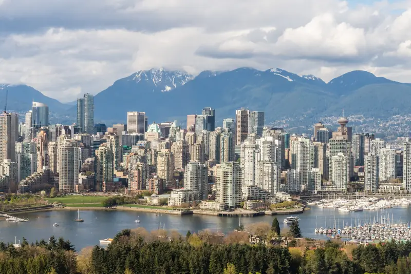 Vancouver skyline with the North Shore mountains and marina